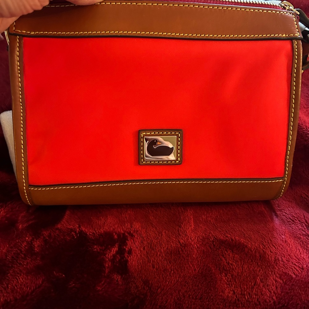 Dooney and Bourke Gorgeous new with tags never even unwrapped bag..